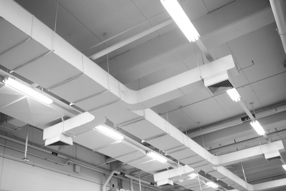 Installed ventilation ductwork and ceiling air outlets
