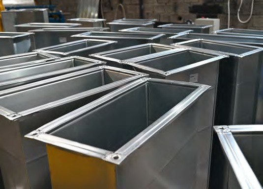 Rectangular self-flanged sheet metal ducts